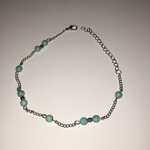 silver anklet with teal marble designed beads